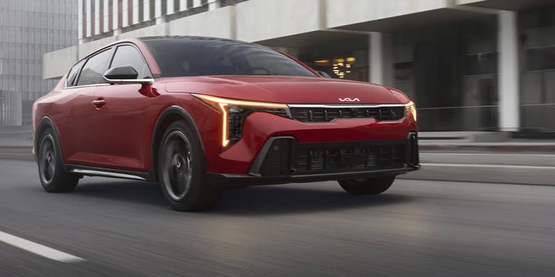 2026 Kia K4 compact sedan on an open road