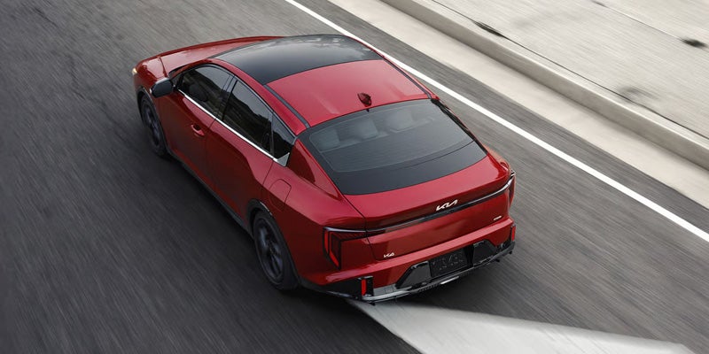 2026 Kia K4 highway driving near the city